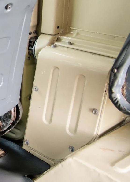 Photo of the fuel tank vent line cover for a 1979+ FJ40.  Land Cruisers manufactured in 1979 and later moved the fuel tank underneath the cab and fully-enclosed the vent lines and filler neck.