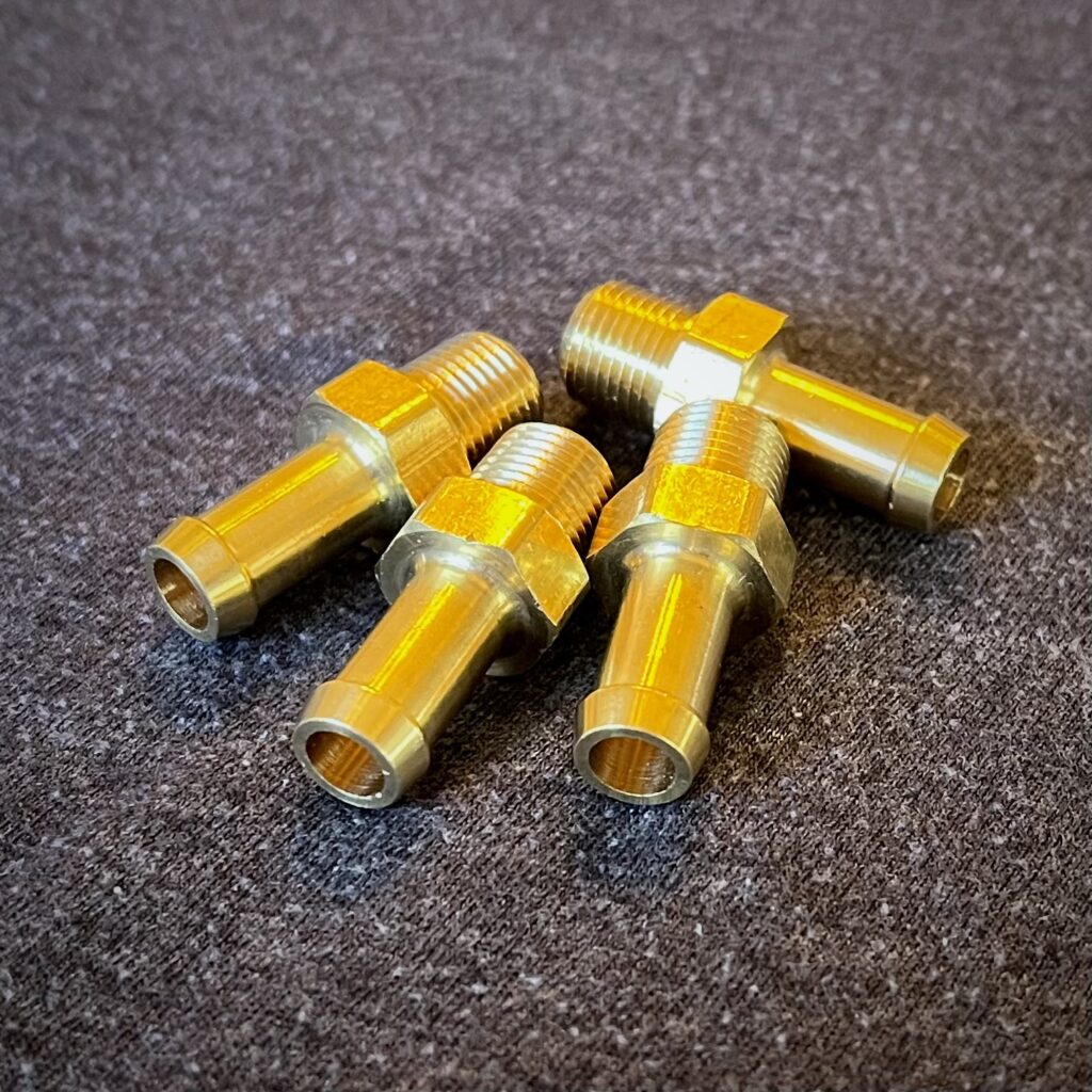 Brass hose adapters come pre-installed in all Evap Separators