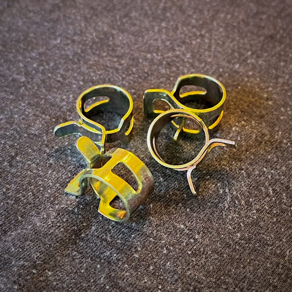 Zinc-plated spring clamps come with all Evap Separators